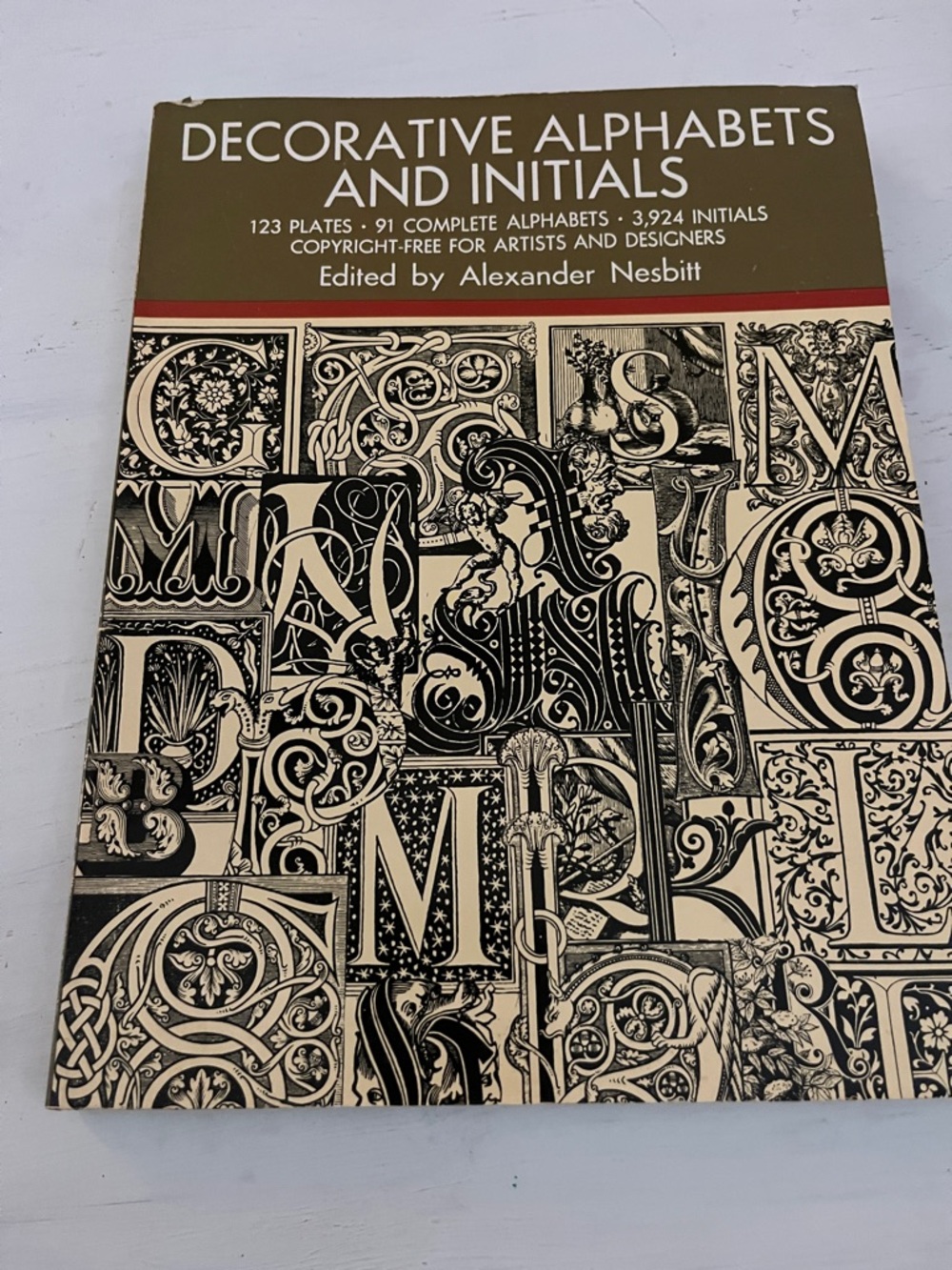 Decorative Alphabets and Initials Book - Beige & Black Cover